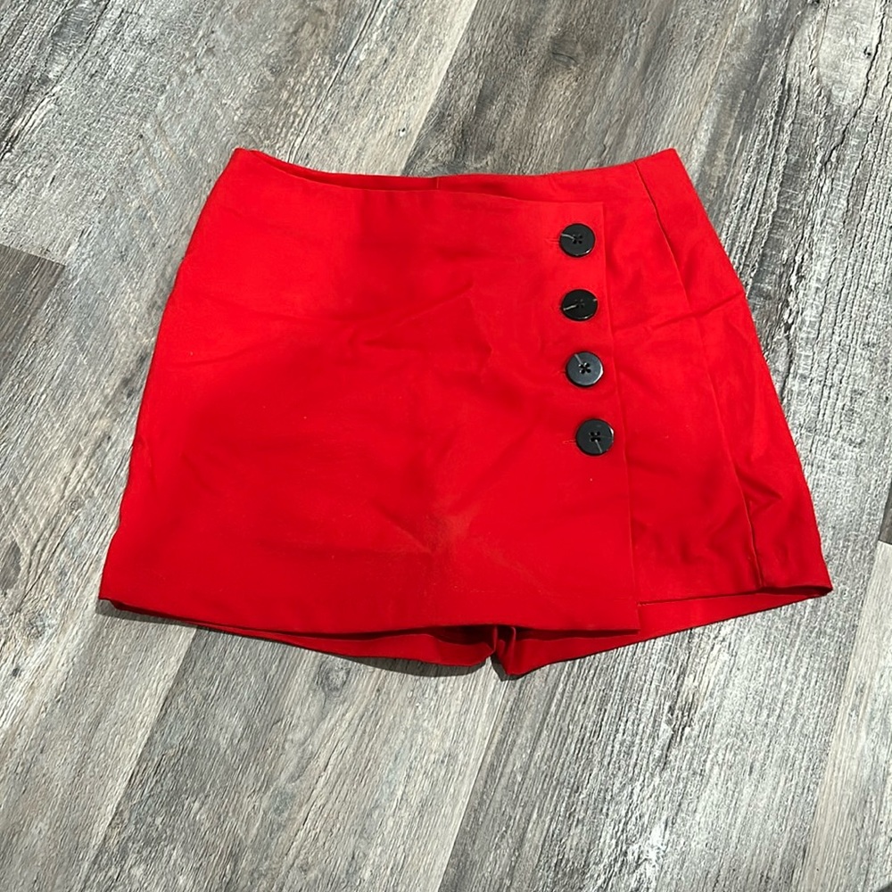Bushka red skirt with black buttons with built-in shorts